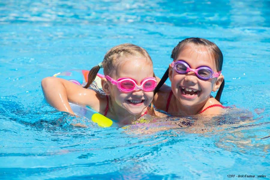 children having fun in the pool